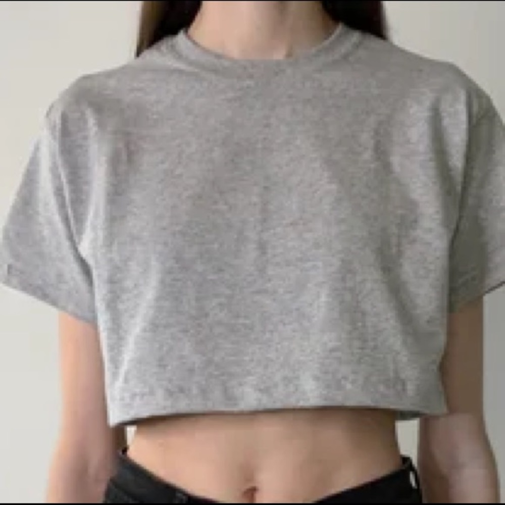 This is a plain light gray crop top in a medium size from Forever 21.